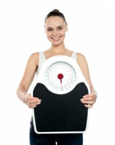How Shelley Tamed Cravings Woman Carrying Weighing Scale